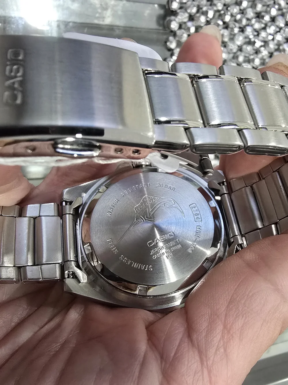 Casio Men's Stainless Steel Watch with Green Bezel